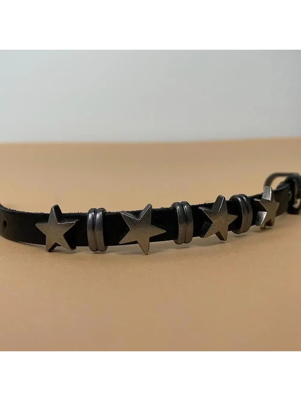 Cyber Y2k style silver star black leather bracelet. Adjustable. Cool design.